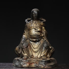 A bronze gold statue of Emperor Zhenwu Buddha