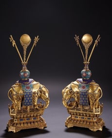 A pair of cloisonné enamel peace elephants