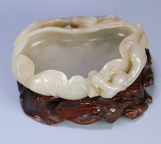 A piece of late Qing Hetian jade dragon pattern lotus leaf wash