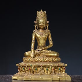 A gem-encrusted Buddha statue