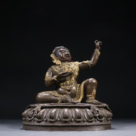 A Qing Dynasty bronze gilt "Great Achiever" statue