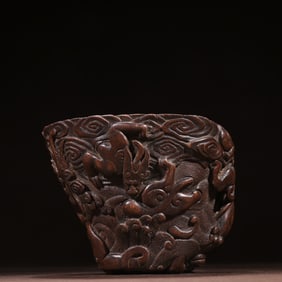 A piece of Qing Dynasty agarwood dragon cup