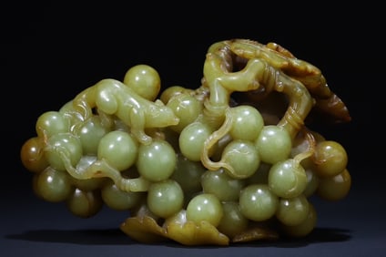 A topaz squirrel grape ornament