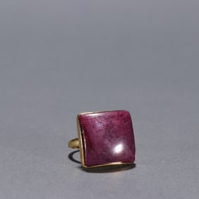 A silver-gilt ruby ring