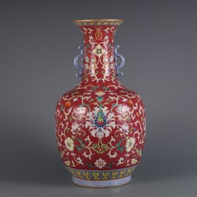 A piece of Qing Qianlong year made carmine ground pastel passion flower pattern amphora bottle