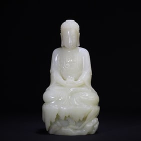 A white jade statue of Shakyamuni Buddha