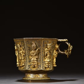 One piece sterling silver gilt figure octagonal cup