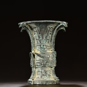 A bronze beast face pattern