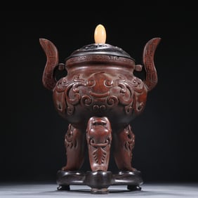 A piece of clear agarwood three-legged ear-punching aromatherapy burner
