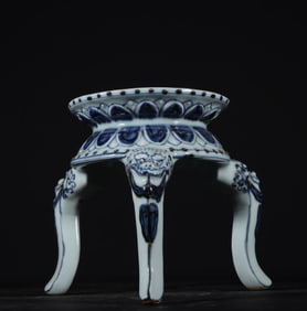 A Ming Dynasty Yongxuan blue and white three-legged beast head seat