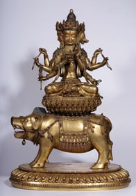 A Qing Dynasty bronze gilt statue of the mother of the Buddha