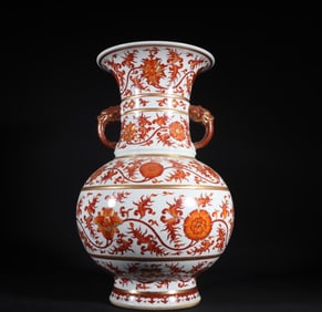 A Qing Dynasty Qianlong alum red painted gold double ear