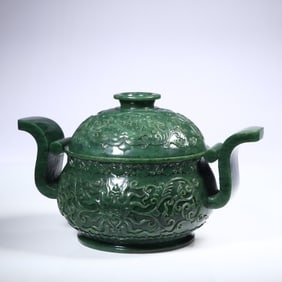 A piece of jade incense burner with entwined branches and floral ornaments