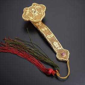 A silver-gilt filigree wishful ornament