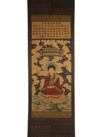 An exterior of a silk Qianlong imperial Buddha statue