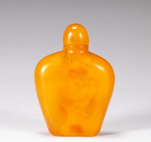 A piece of beeswax snuff bottle