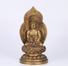 A bronze gilt statue of Shakyamuni