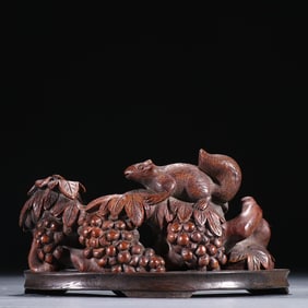 A late Qing bamboo carved squirrel grape ornament