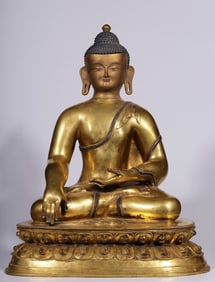 A Qing Dynasty bronze gilt Buddha seated statue