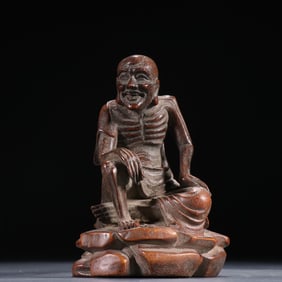 A late Qing Dynasty bamboo carving skinny Arhat ornament