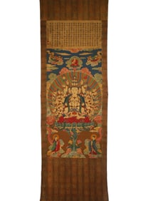 A silk statue of the Mother of the Buddha