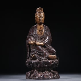 A piece of Qing agarwood depicting gold Guanyin ornaments