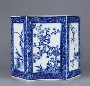 A piece of blue and white windowed plum orchid bamboo chrysanthemum pen holder