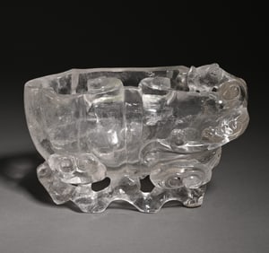 A copper-gilt holding pot