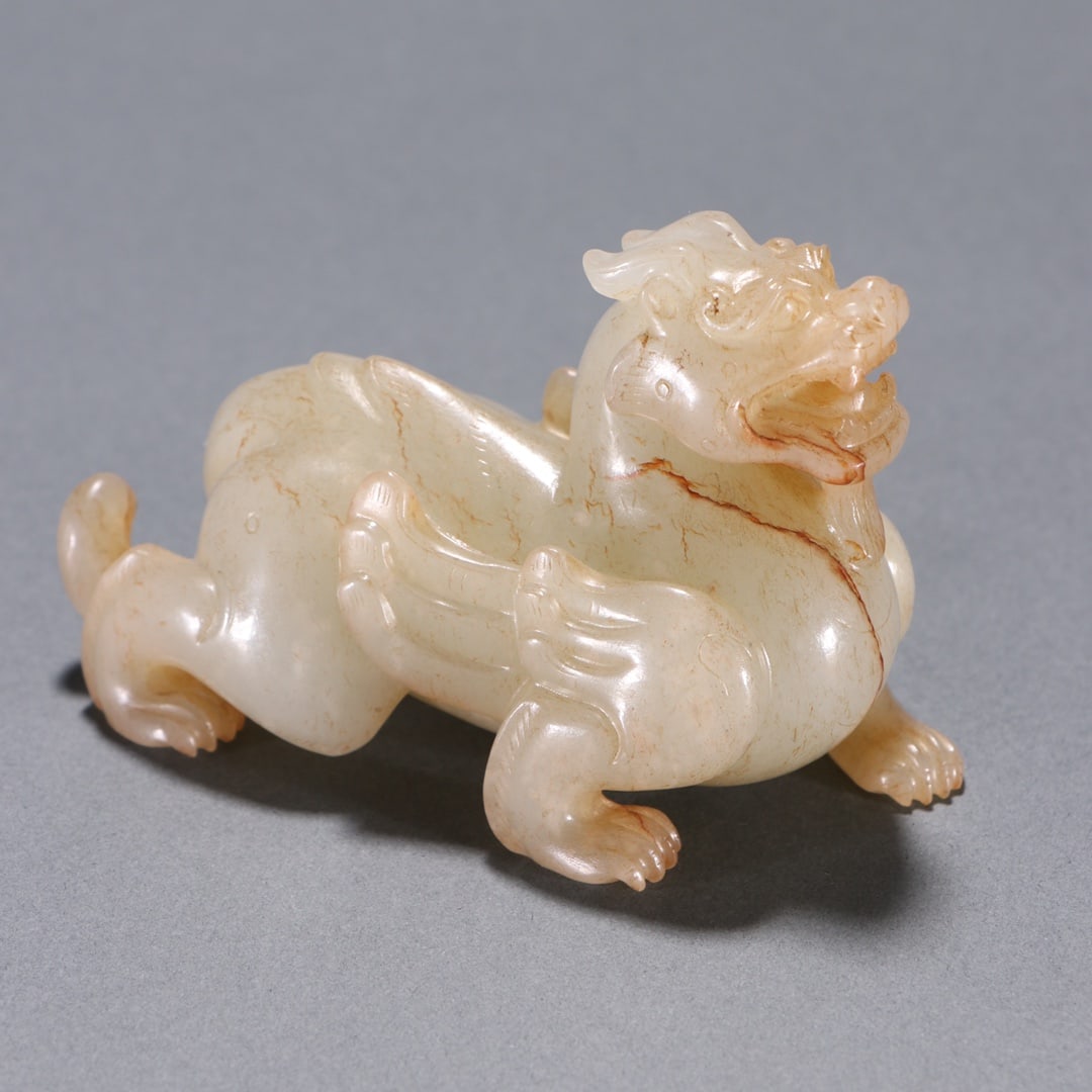 A Han Hetian jade beast ornament (1 of 9)