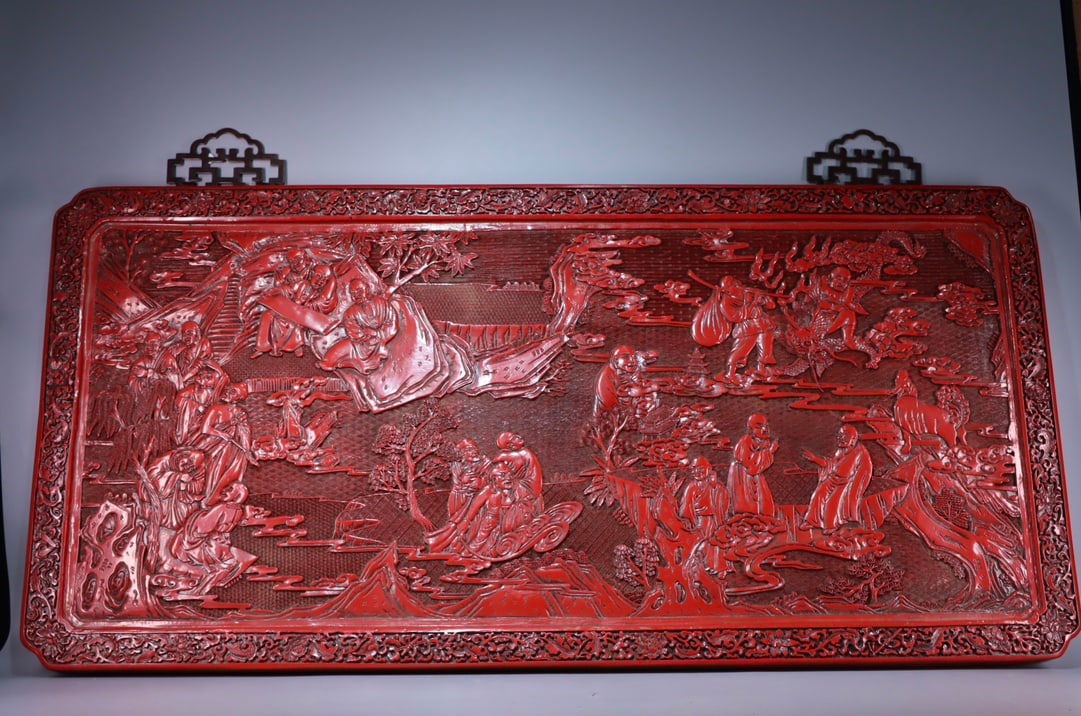 A red lacquer carved eighteen Arhats hanging screen (1 of 14)