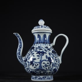 A Ming Dynasty Xuande blue and white flower and fruit pattern holding pot