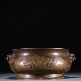 A Xuande model copper tire chisel "Bogutu" lion ear incense burner