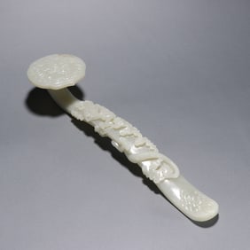 A piece of Qing Hetian jade seed material dragon pattern Ruyi a handle