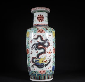 A Qing Dynasty Kangxi multicolored dragon pattern rod bottle