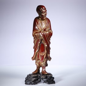 A wood carving book scroll arhat ornament