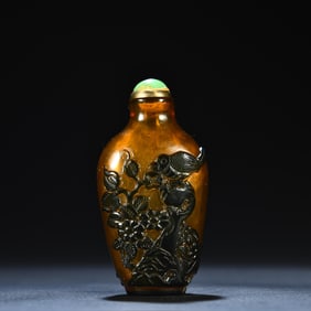 An old glazed carved snuff bottle