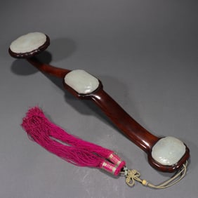 A piece of Qing Dynasty white jade with three inlaid jade Ruyi