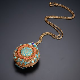 A Qing Dynasty silver-gilt gem-encrusted sachet