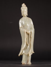 A Ming Hetian jade seed statue of Guanyin