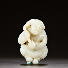 An old Hetian jade Ruyi boy carving