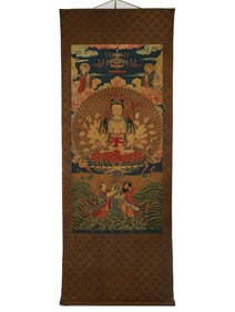 A silk statue of the Mother of the Buddha