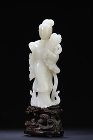 A fan-wielding lady ornament