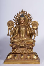 A Qing Dynasty bronze gilt Swat style seated statue of Baosheng Buddha