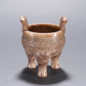 A piece of ancient jade three-legged tripod