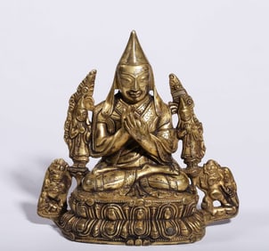 A bronze gilt statue of Tsongkhapa and his two disciples from the Qing Dynasty