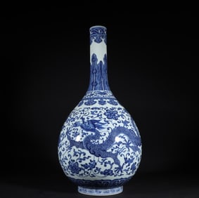 A Qing Dynasty Yongzheng blue and white dragon wearing a floral pattern gall bottle