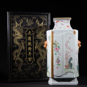A Qing Dynasty Qianlong pastel square animal ear vase
