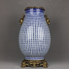 A blue and white longevity inlaid with bronze sheep's head and ears blessed bucket