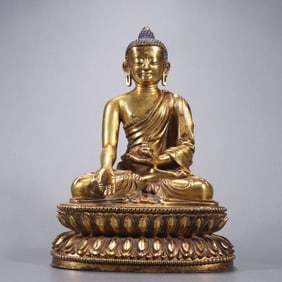 A Qing Dynasty bronze gilt statue of Sakyamuni