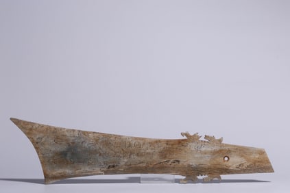 A piece of ancient jade engraved with the inscription jade